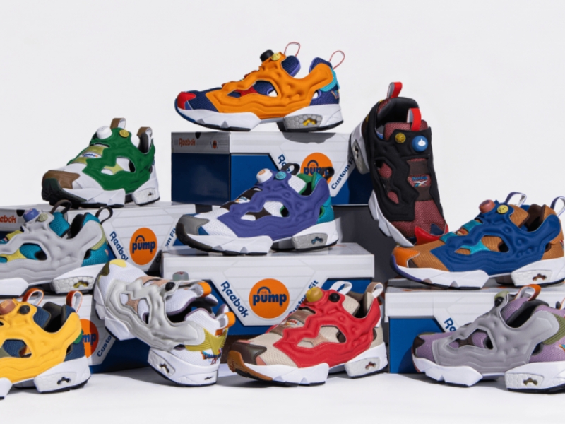 Reebok x Dragon Quest IX Instapump Fury 94 sneaker with slime silhouette on pump ball and treasure chest shoe box, 40th anniversary collaboration