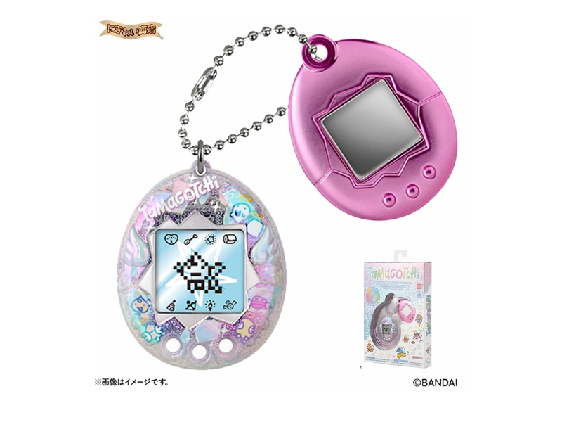 Original Tamagotchi Celebration Reflection Angel revival edition featuring an aurora mirror shell design and a custom pink-silver mirror charm.