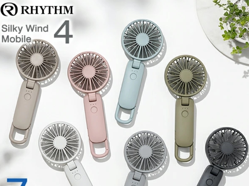 RHYTHM Silky Wind Mobile 4 double-blade handheld portable fan with carabiner clip for summer outdoor cooling.