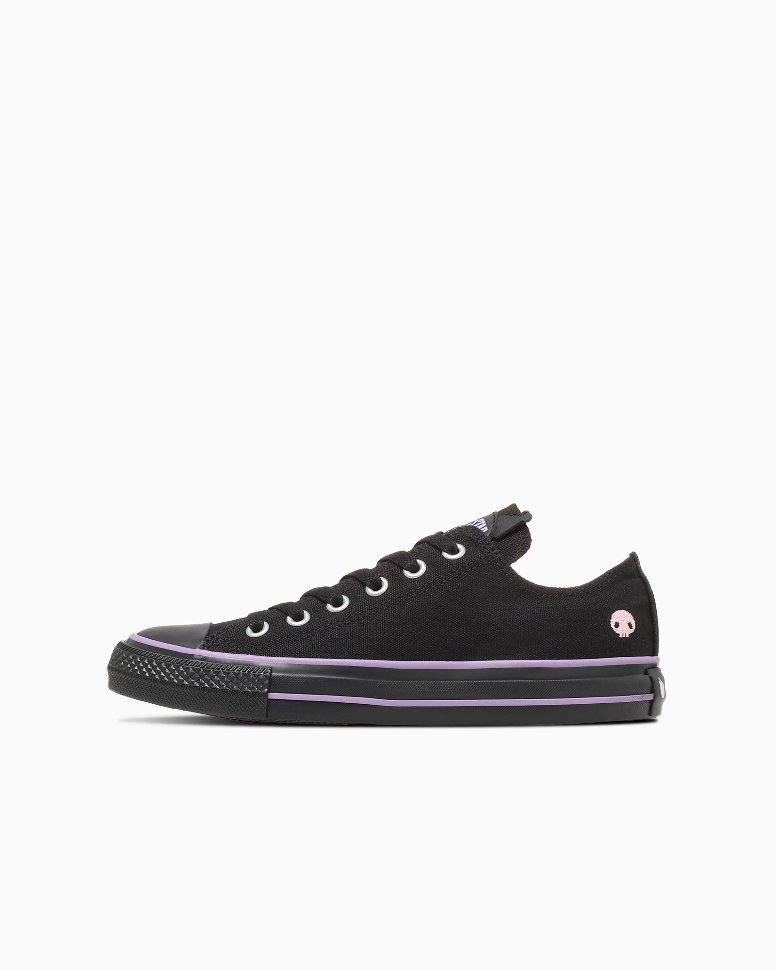 CONVERSE Japan x Sanrio ALL STAR OX Kuromi low-top sneakers in black and purple with skull embroidery and Kuromi face tongue label
