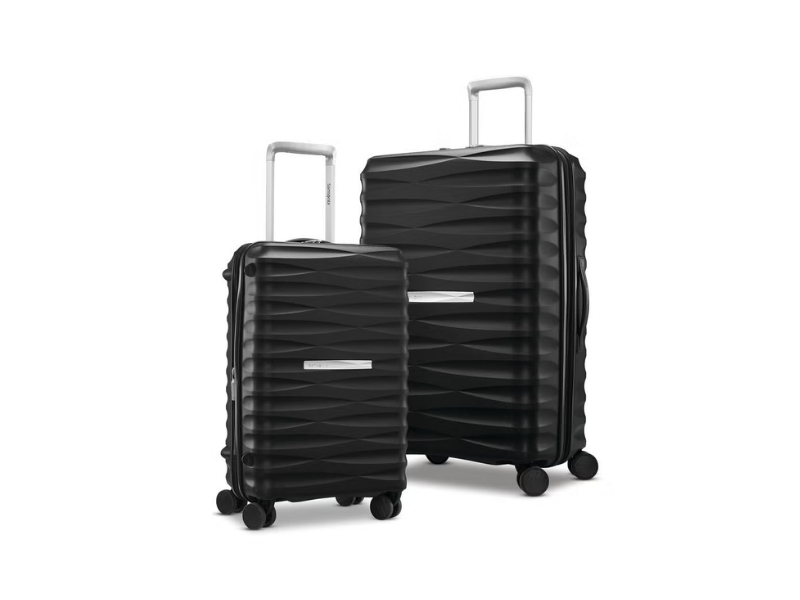 Samsonite Voltage DLX hardside two-piece luggage set including a carry-on and a medium checked suitcase.